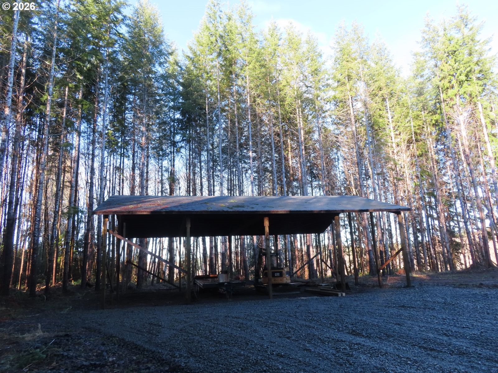 2431 North River Road Cosmopolis, WA 98537 - Photo 2 of 27 a view of a roof deck with wooden floor and fence