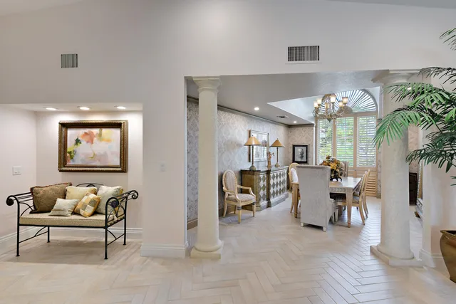 a view of a dining room with furniture window and outside view