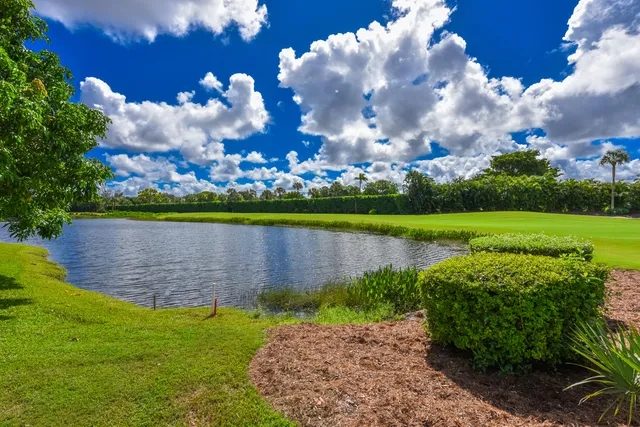 a view of a lake with a big yard