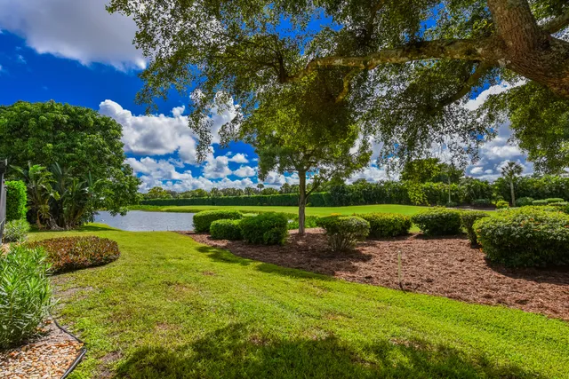 a view of a lake with a big yard