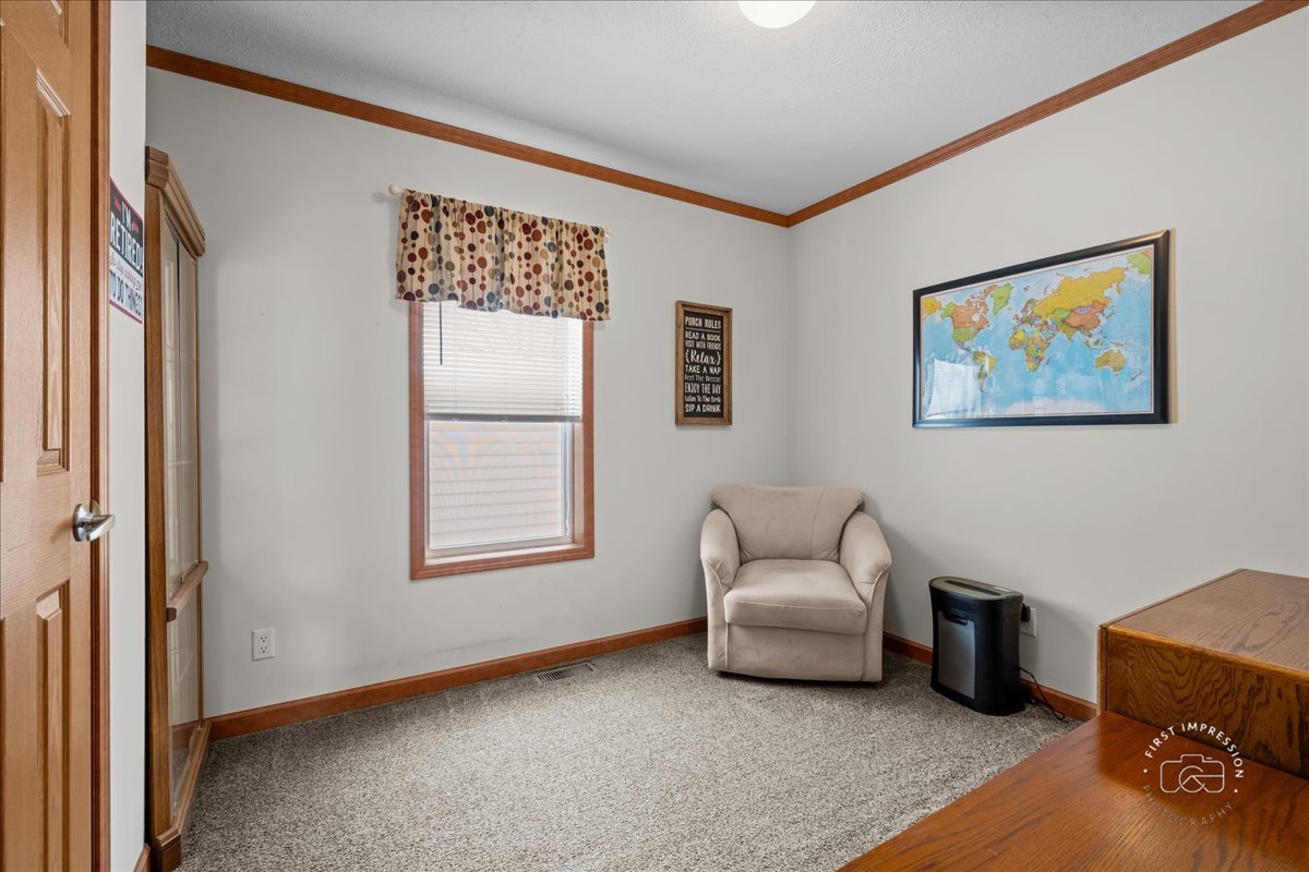 1116 Lakeview Road Elgin, IL 60123 - Photo 16 of 17 a living room with furniture and a window