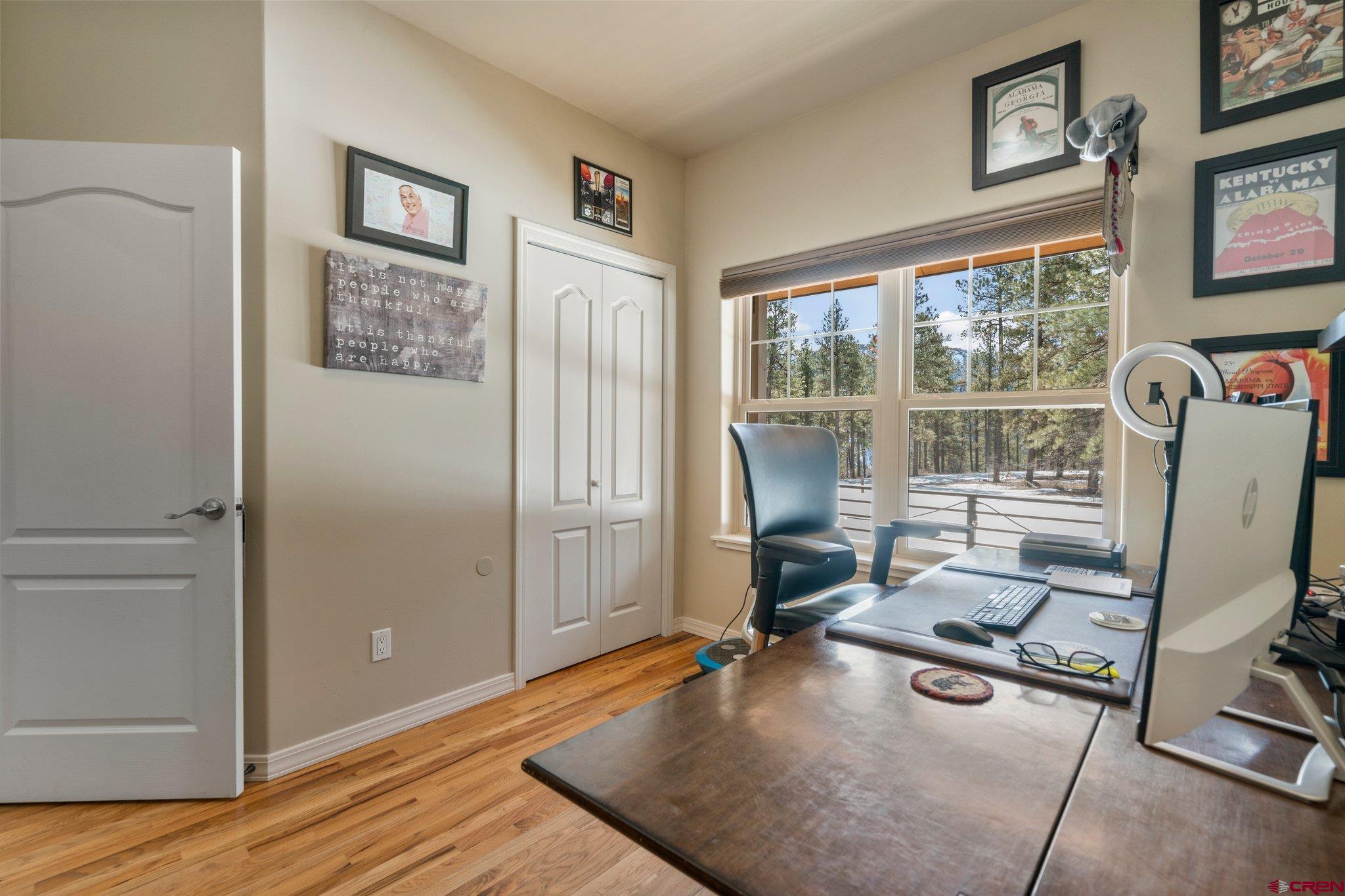 6072 County Road 240 Durango, CO 81301 - Photo 13 of 35 a room with gym equipment and a large window