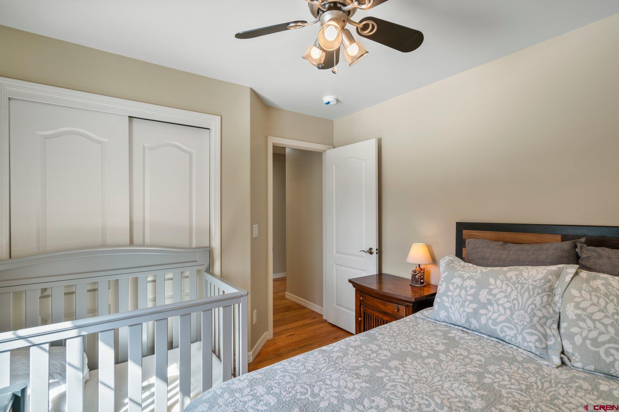 6072 County Road 240 Durango, CO 81301 - Photo 25 of 35 a bedroom with furniture and a window