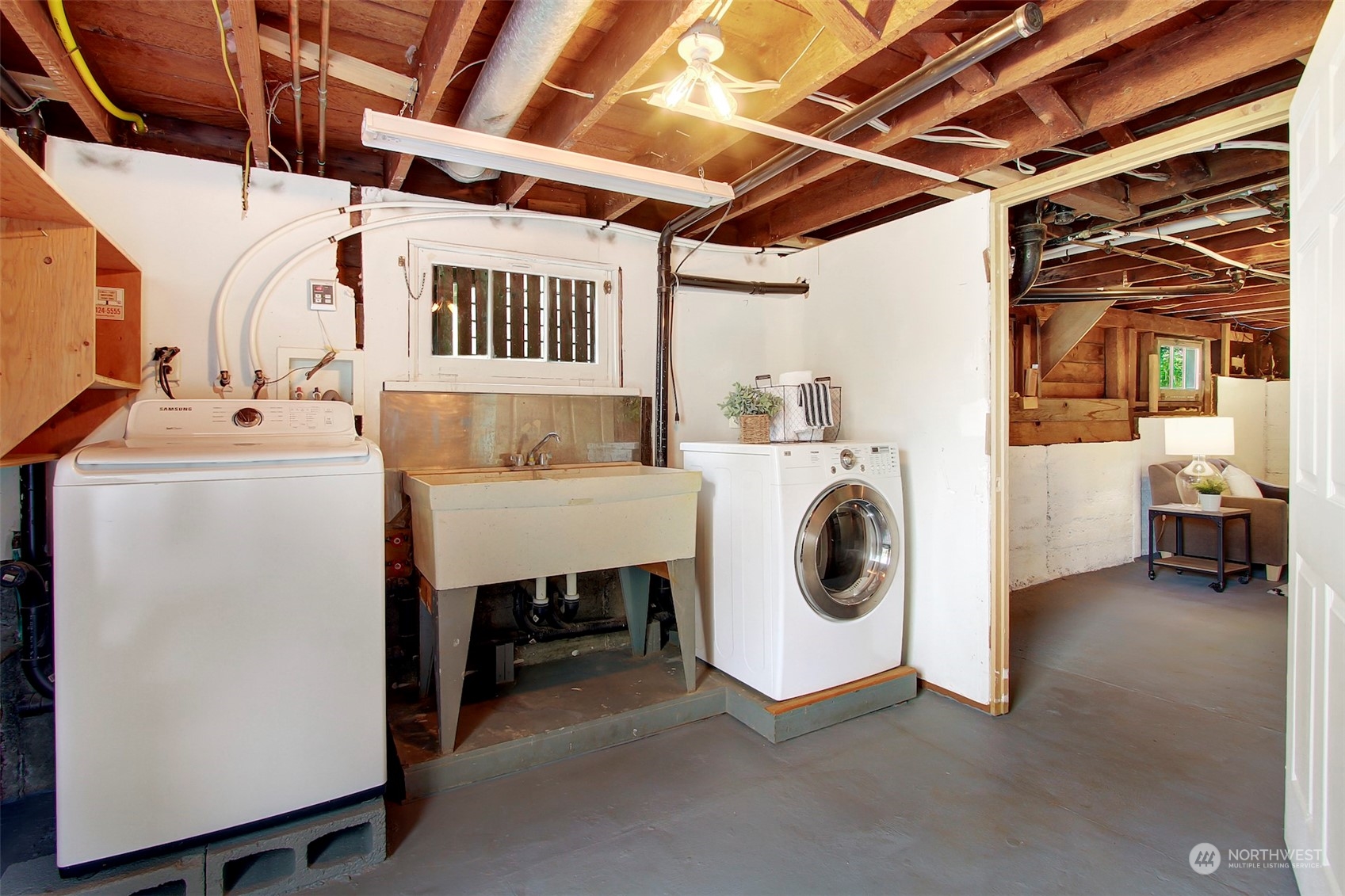 6021 48th Avenue Southwest Seattle, WA 98136 - Photo 21 of 35 a utility room with dryer and washer