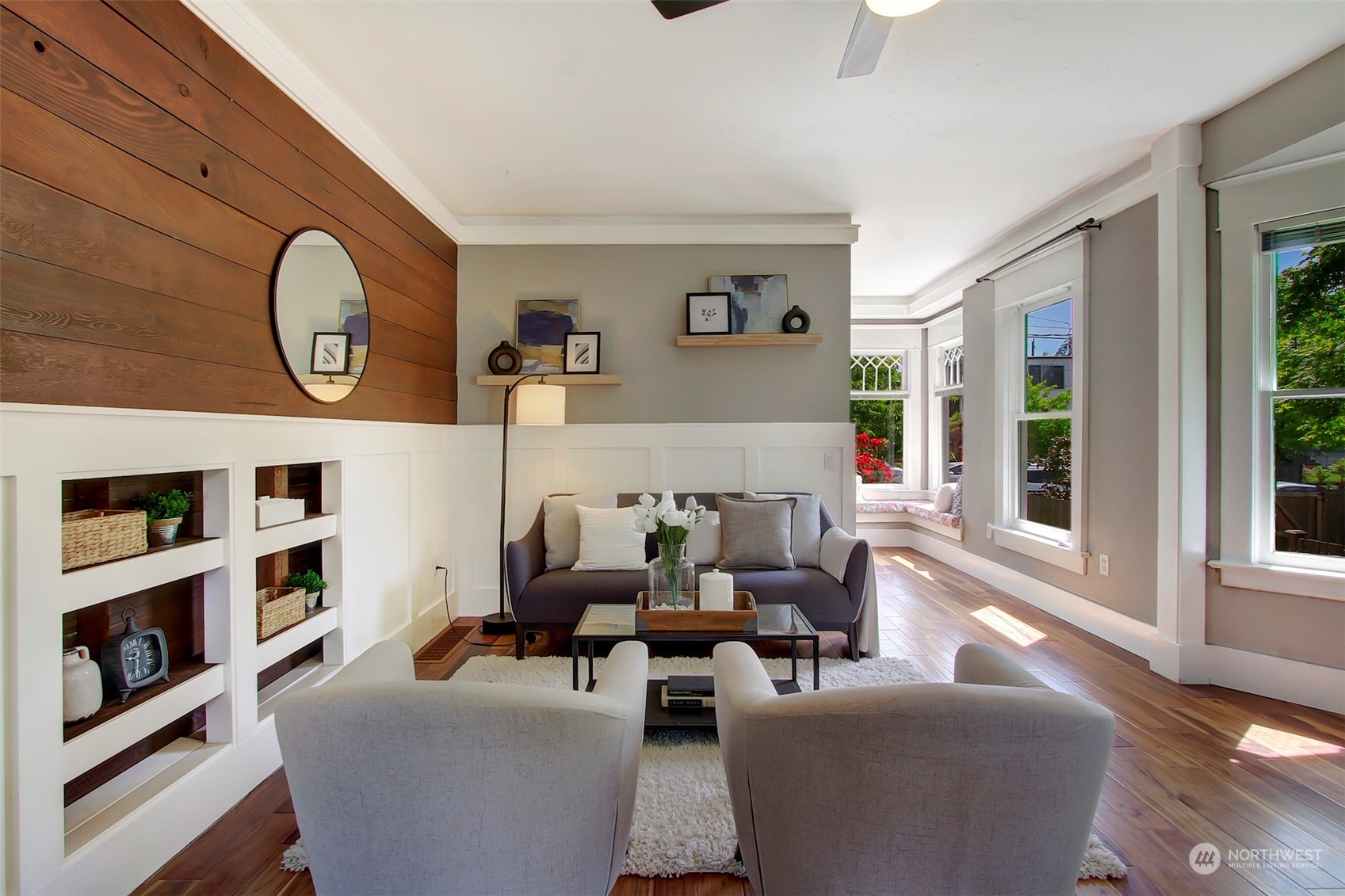 6021 48th Avenue Southwest Seattle, WA 98136 - Photo 6 of 35 a living room with fireplace furniture and a large window