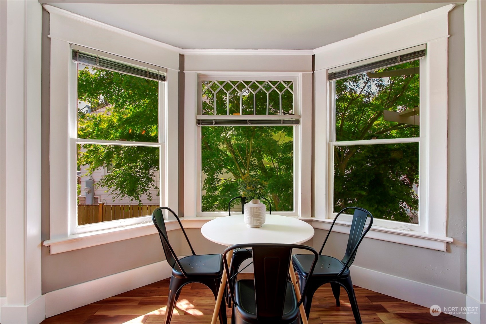 6021 48th Avenue Southwest Seattle, WA 98136 - Photo 9 of 35 a view of a dining room with furniture window and outside view