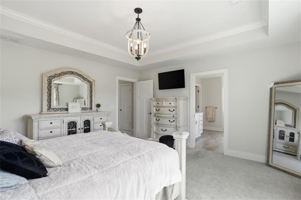 213 Hickory Lane Mars, PA 16046 - Photo 29 of 46 a bedroom with a bed and a television