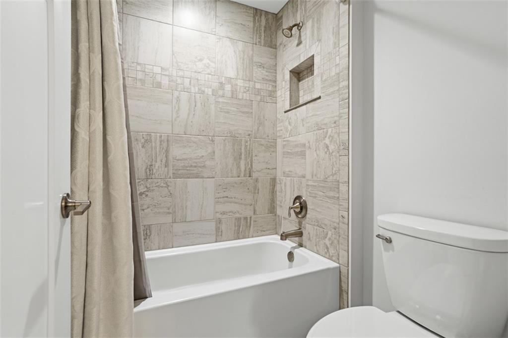 213 Hickory Lane Mars, PA 16046 - Photo 30 of 46 a bathroom with a toilet and a bathtub