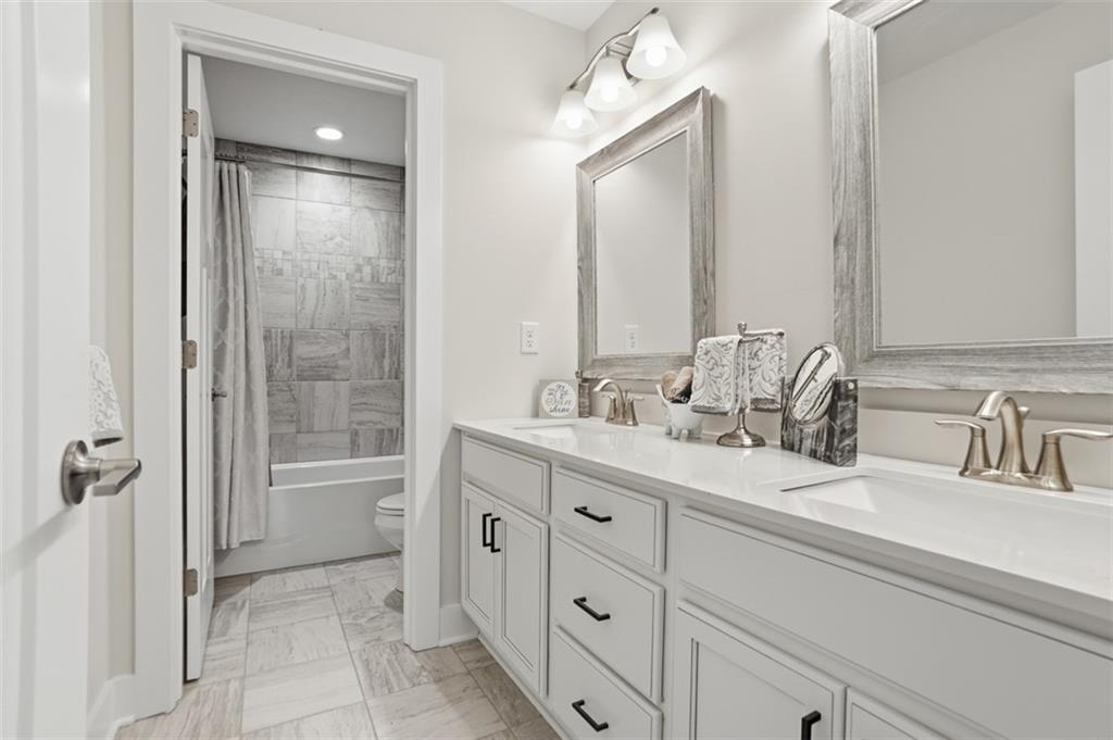 213 Hickory Lane Mars, PA 16046 - Photo 33 of 46 a bathroom with a double vanity sink mirror and bathtub