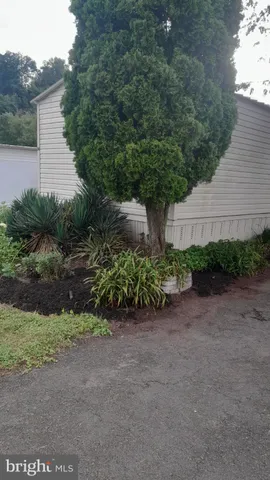 a view of a house with a street