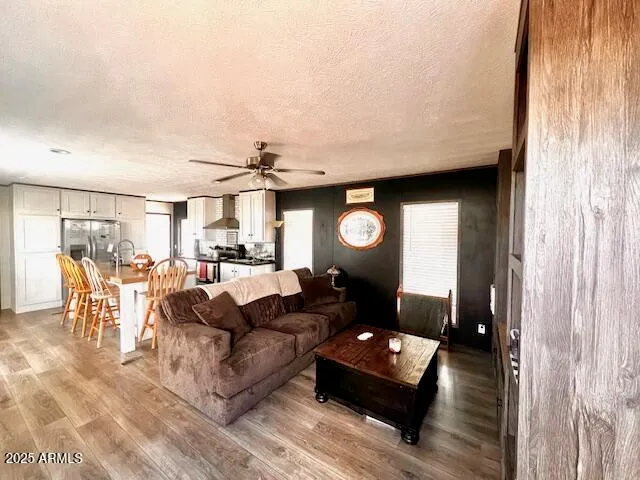 a living room with furniture and a window