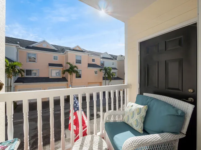 a balcony with furniture