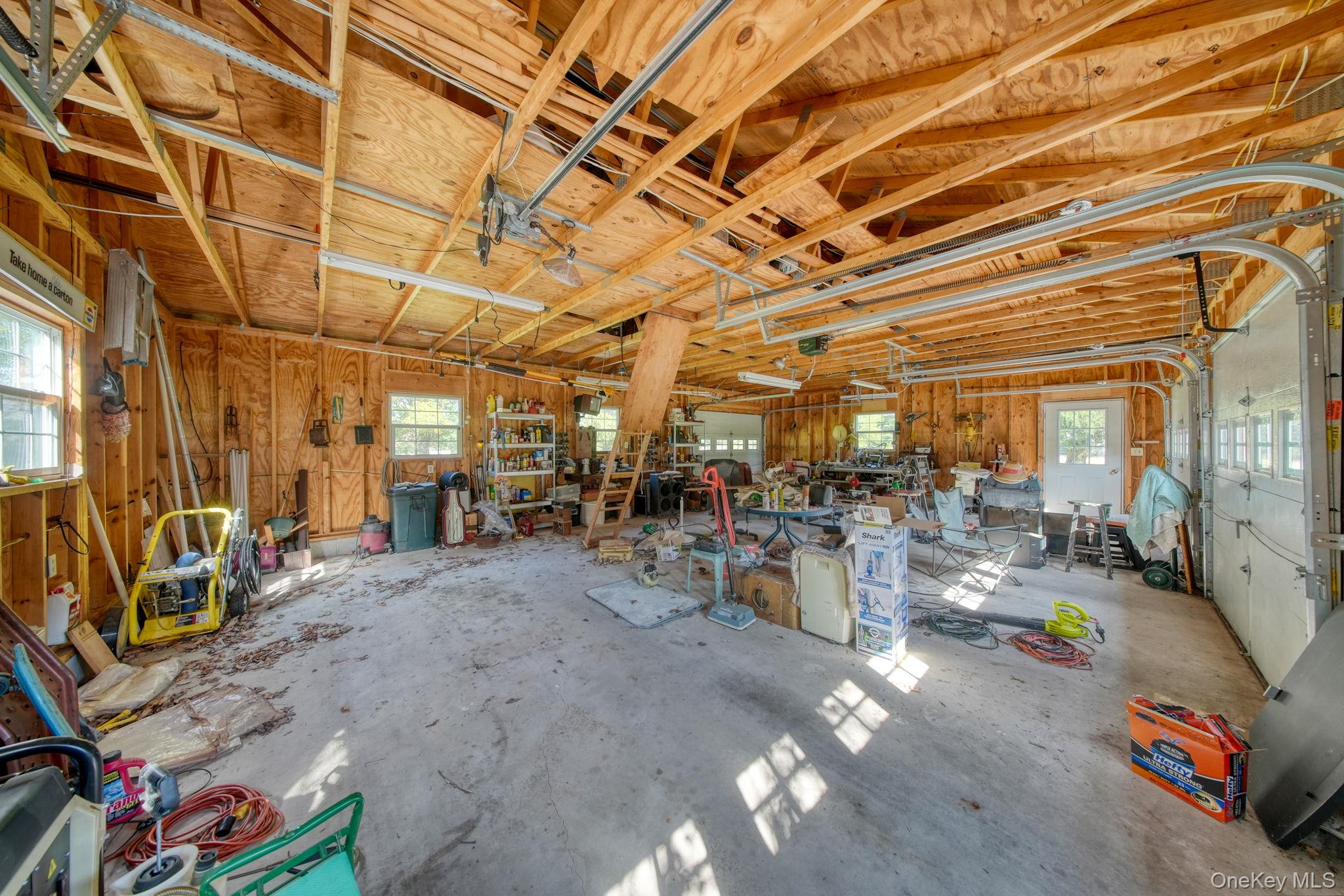 128 Hall Road Grahamsville, NY 12740 - Photo 25 of 34 Garage with a workshop area
