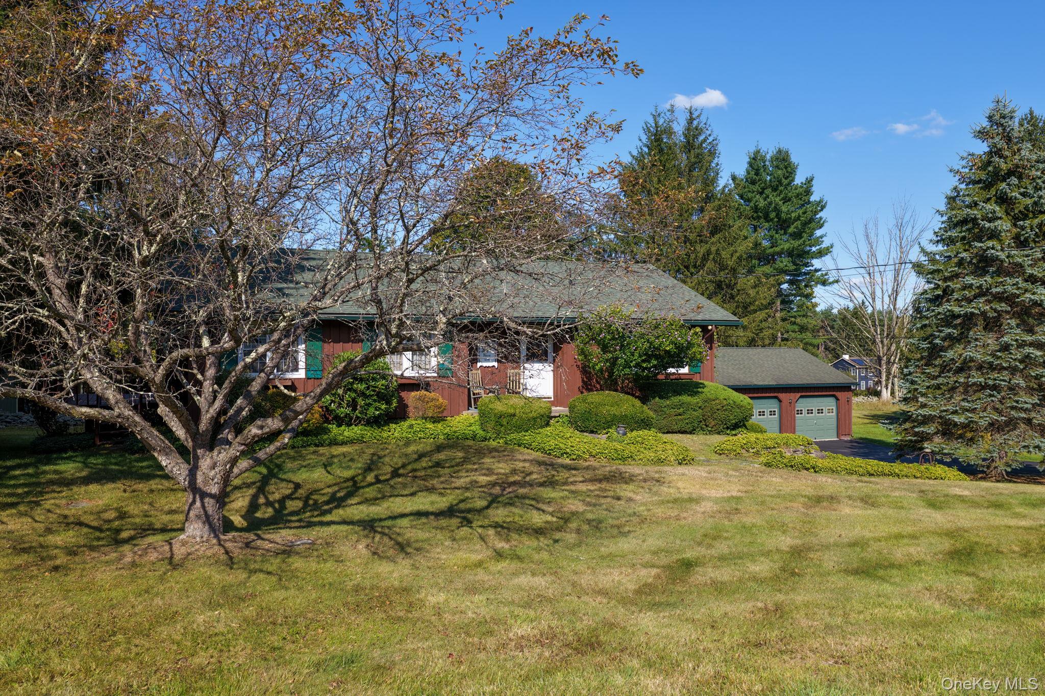 128 Hall Road Grahamsville, NY 12740 - Photo 33 of 34 a front view of a house with a yard