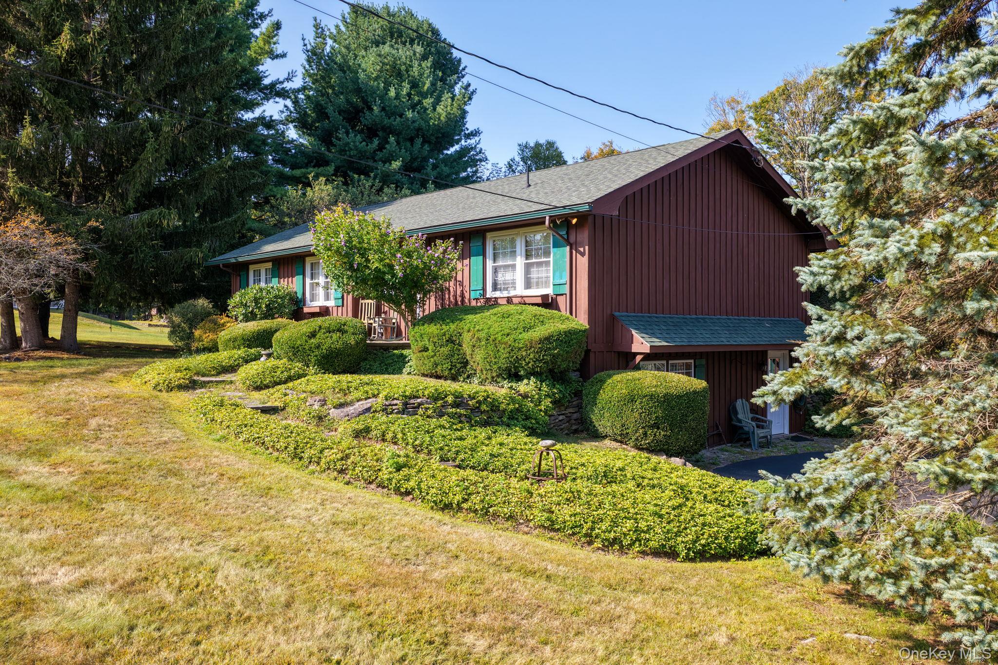 128 Hall Road Grahamsville, NY 12740 - Photo 5 of 34 a front view of house with yard and green space