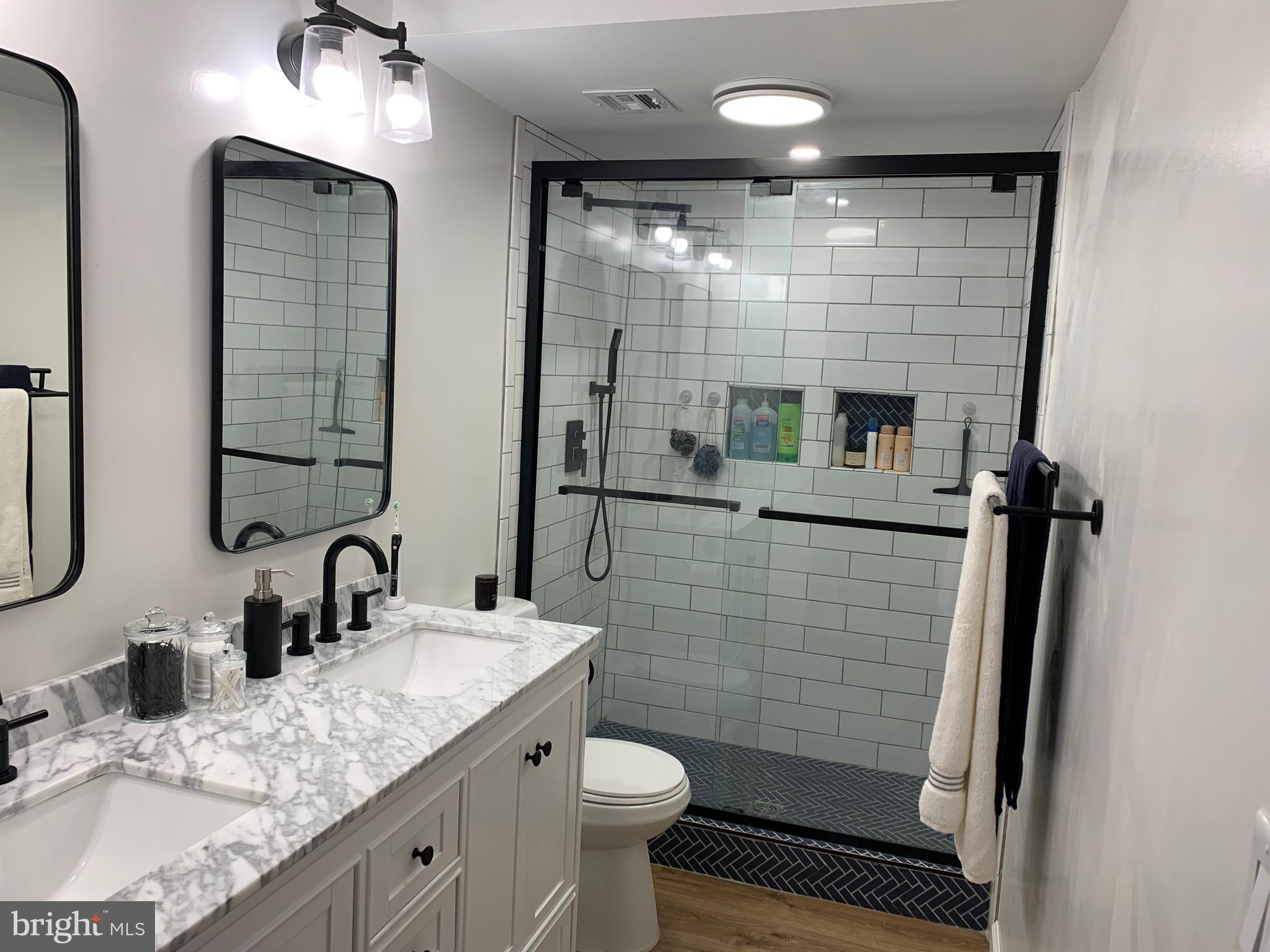 136 Avondale Drive Sterling, VA 20164 - Photo 16 of 30 Remodeled Master Bath with Custom Walk in Shower