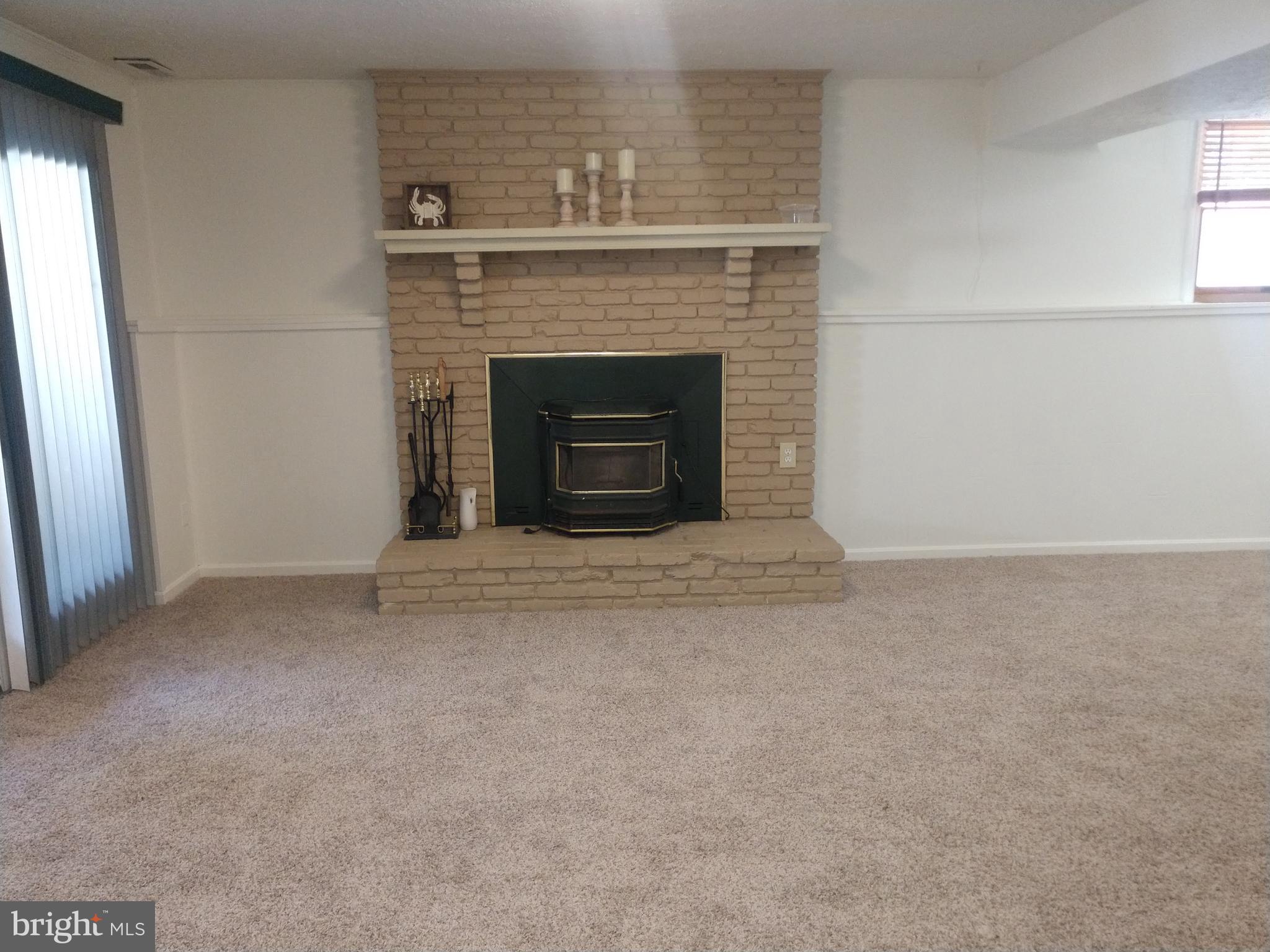219 Sillery Bay Road Pasadena, MD 21122 - Photo 16 of 32 Fireplace with insert