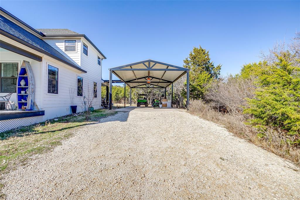4920 Shining Star Trail Rio Vista, TX 76093 - Photo 34 of 39 a front view of a house with a yard