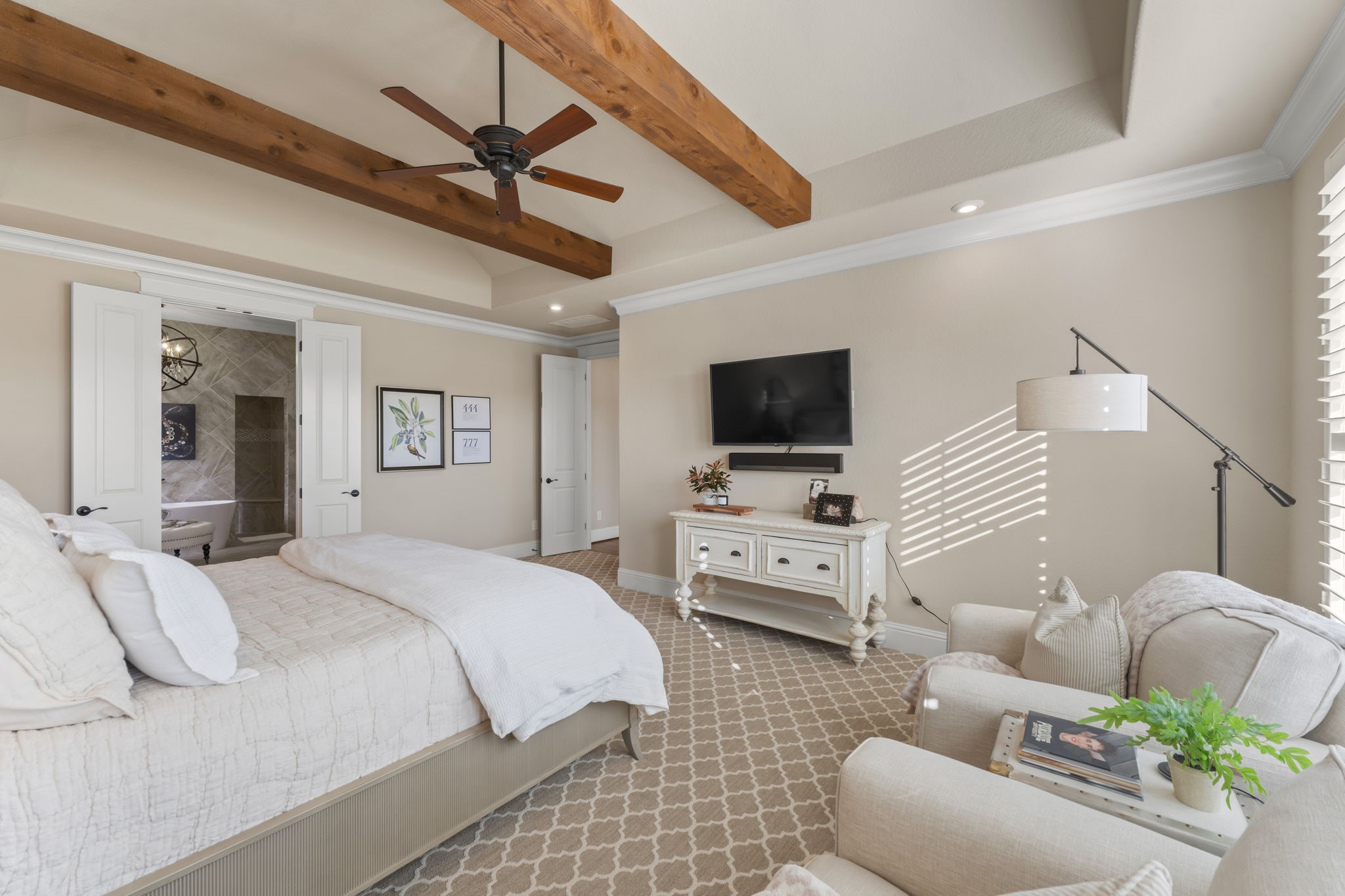 2203 Flameleaf Court Conroe, TX 77384 - Photo 22 of 49 a bedroom with furniture and a flat screen tv