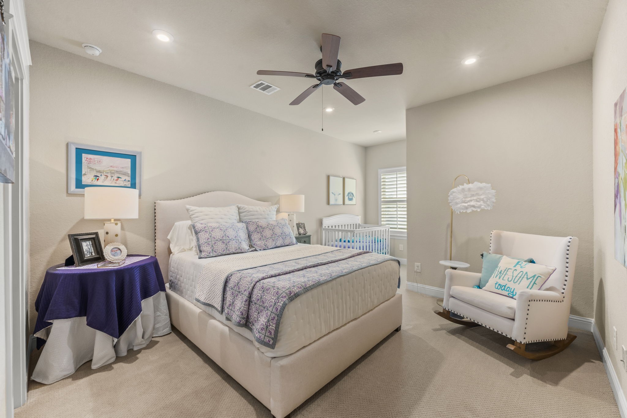 2203 Flameleaf Court Conroe, TX 77384 - Photo 33 of 49 a bedroom with a bed and ceiling fan