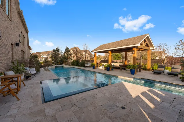 a outdoor dining space with furniture and outdoor view