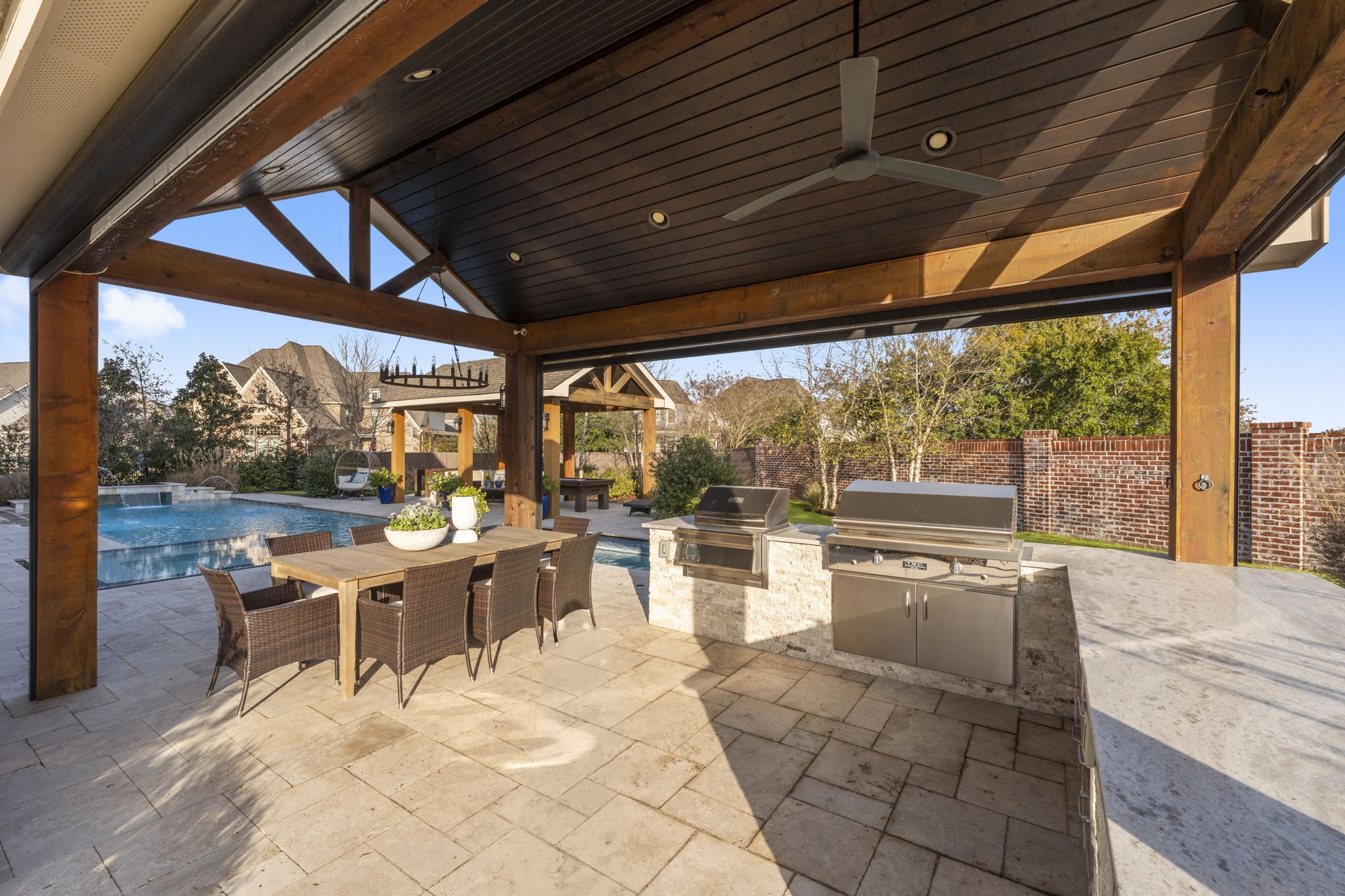 2203 Flameleaf Court Conroe, TX 77384 - Photo 39 of 49 a outdoor space with lots of tables a large window and chairs