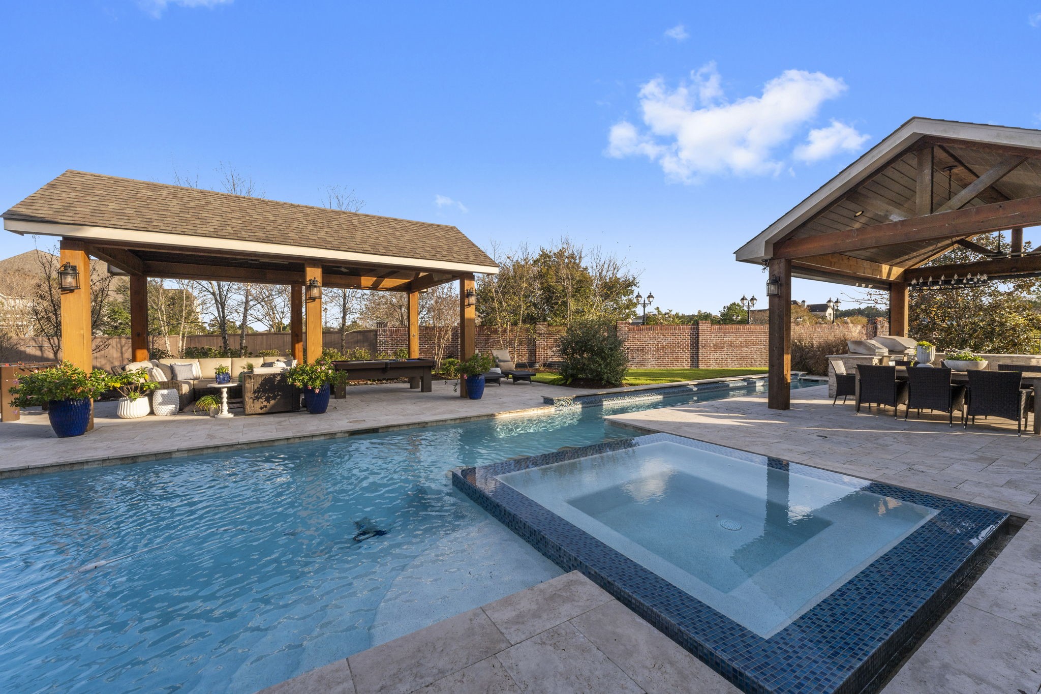 2203 Flameleaf Court Conroe, TX 77384 - Photo 4 of 49 a view of a swimming pool with outdoor seating