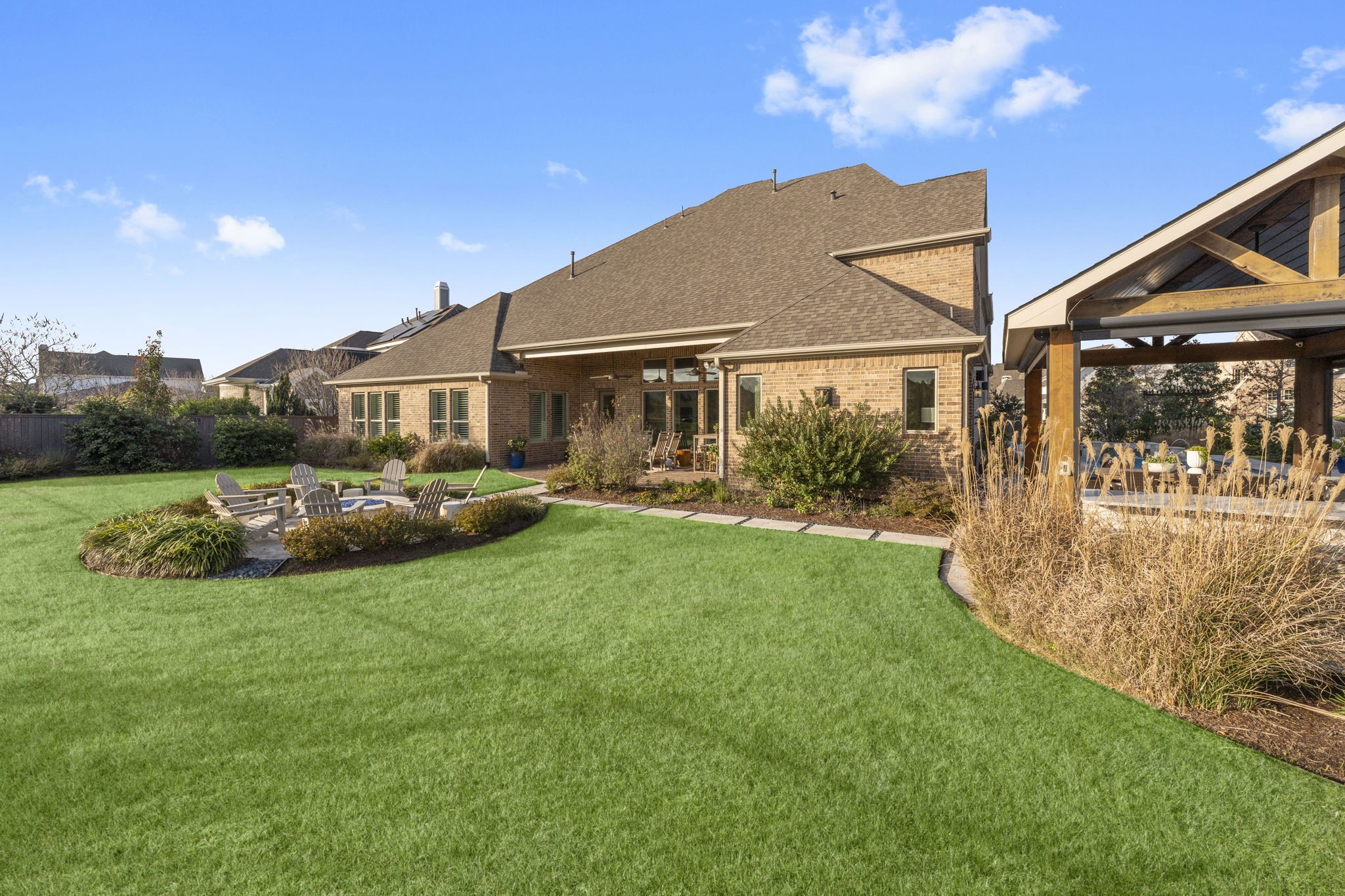 2203 Flameleaf Court Conroe, TX 77384 - Photo 46 of 49 a view of a house with a big yard and potted plants