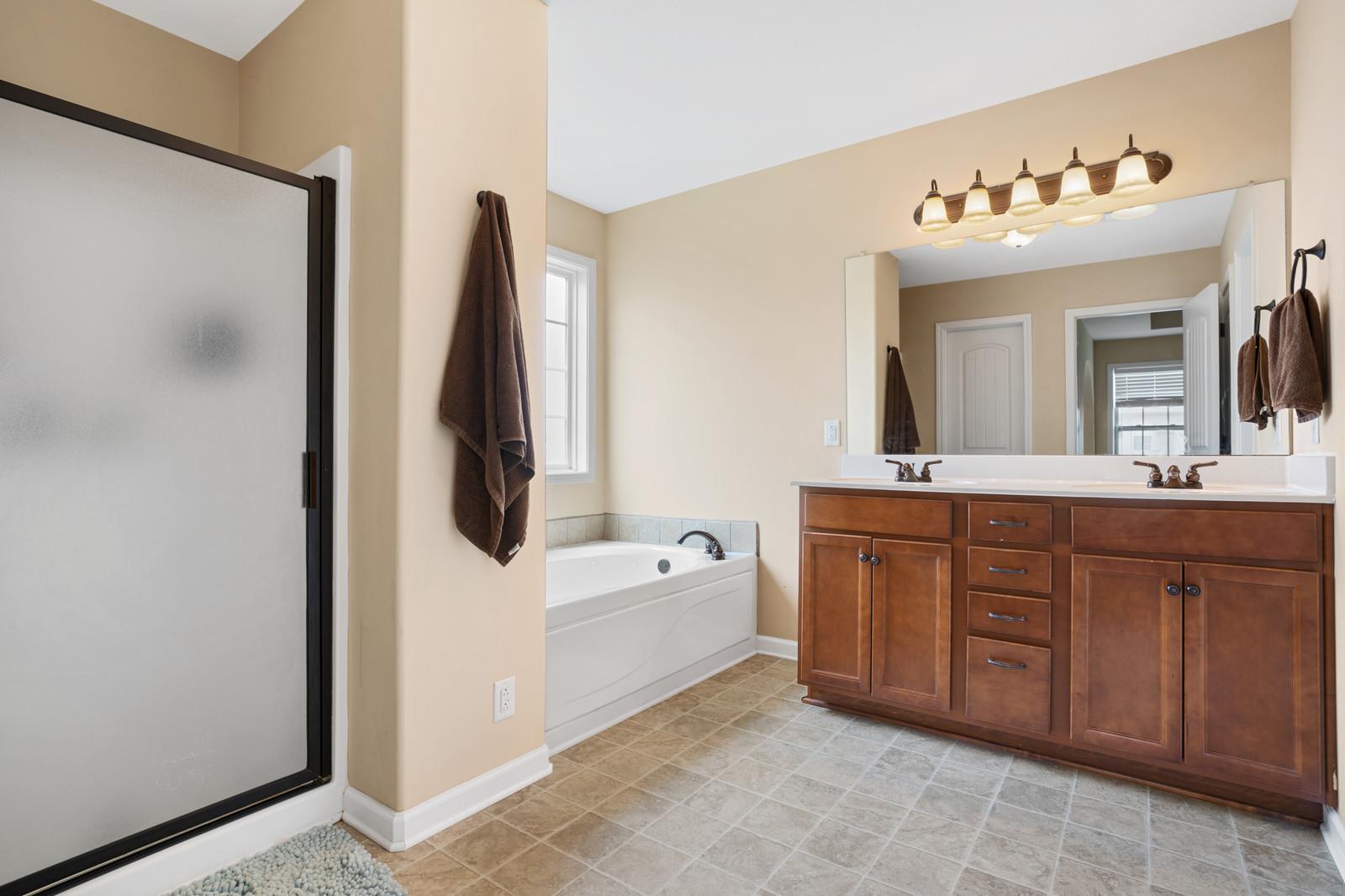3787 Suiter Road Clarksville, TN 37040 - Photo 15 of 23 a bathroom with a sink vanity and mirror