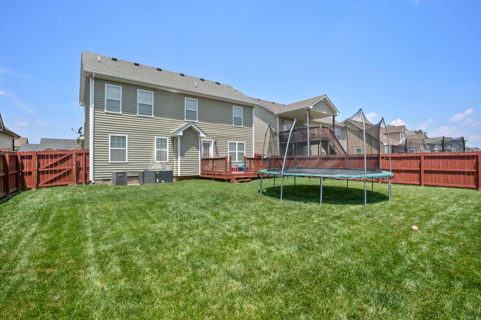 3787 Suiter Road Clarksville, TN 37040 - Photo 21 of 23 a view of a house with a backyard