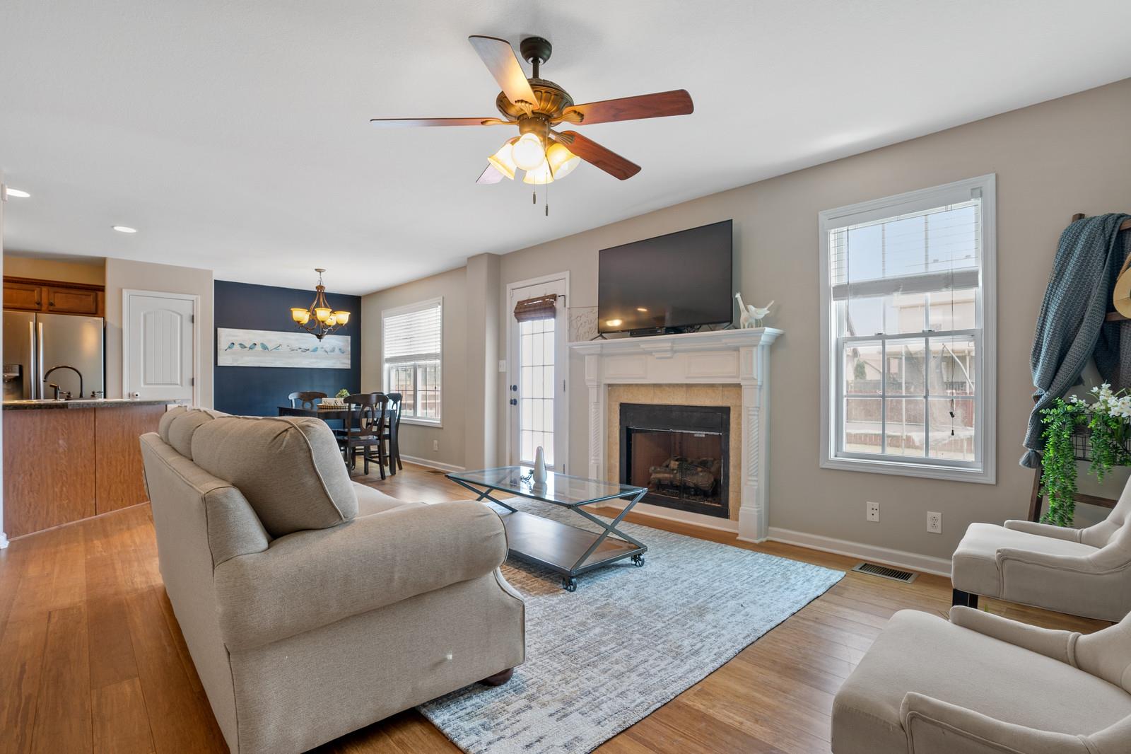 3787 Suiter Road Clarksville, TN 37040 - Photo 6 of 23 a living room with furniture fireplace and flat screen tv