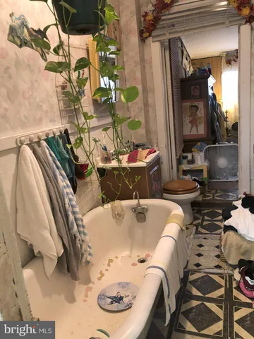 a living room with a couch and a table