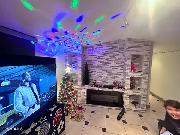 a bathroom with a sink mirror and vanity