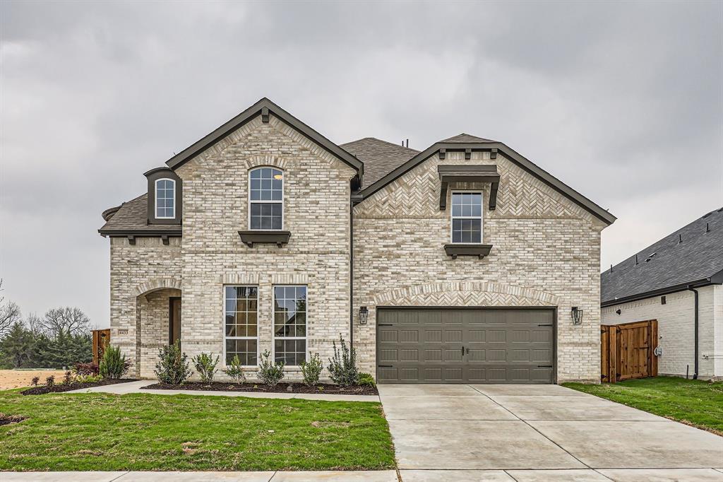 4433 Timberdrift Street Midlothian, TX 76065 - Photo 1 of 1 French country inspired facade featuring a front yard, brick siding, and concrete driveway