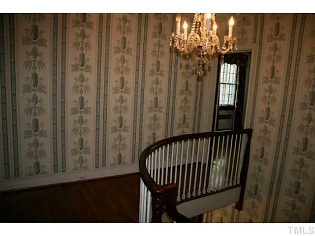 1001 Vance Street Raleigh, NC 27608 - Photo 11 of 15 a view of a porch with a door