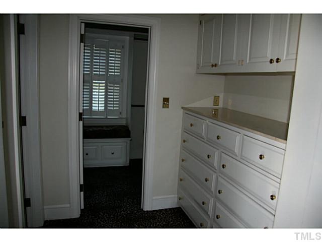 1001 Vance Street Raleigh, NC 27608 - Photo 14 of 15 a view of room with cabinet