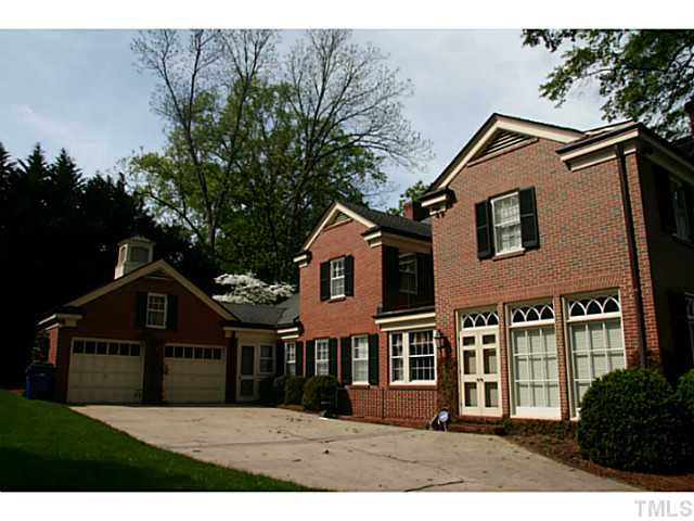 1001 Vance Street Raleigh, NC 27608 - Photo 2 of 15 a front view of a house with a yard