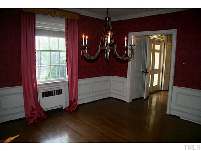 1001 Vance Street Raleigh, NC 27608 - Photo 9 of 15 a view of an entryway with wooden floor