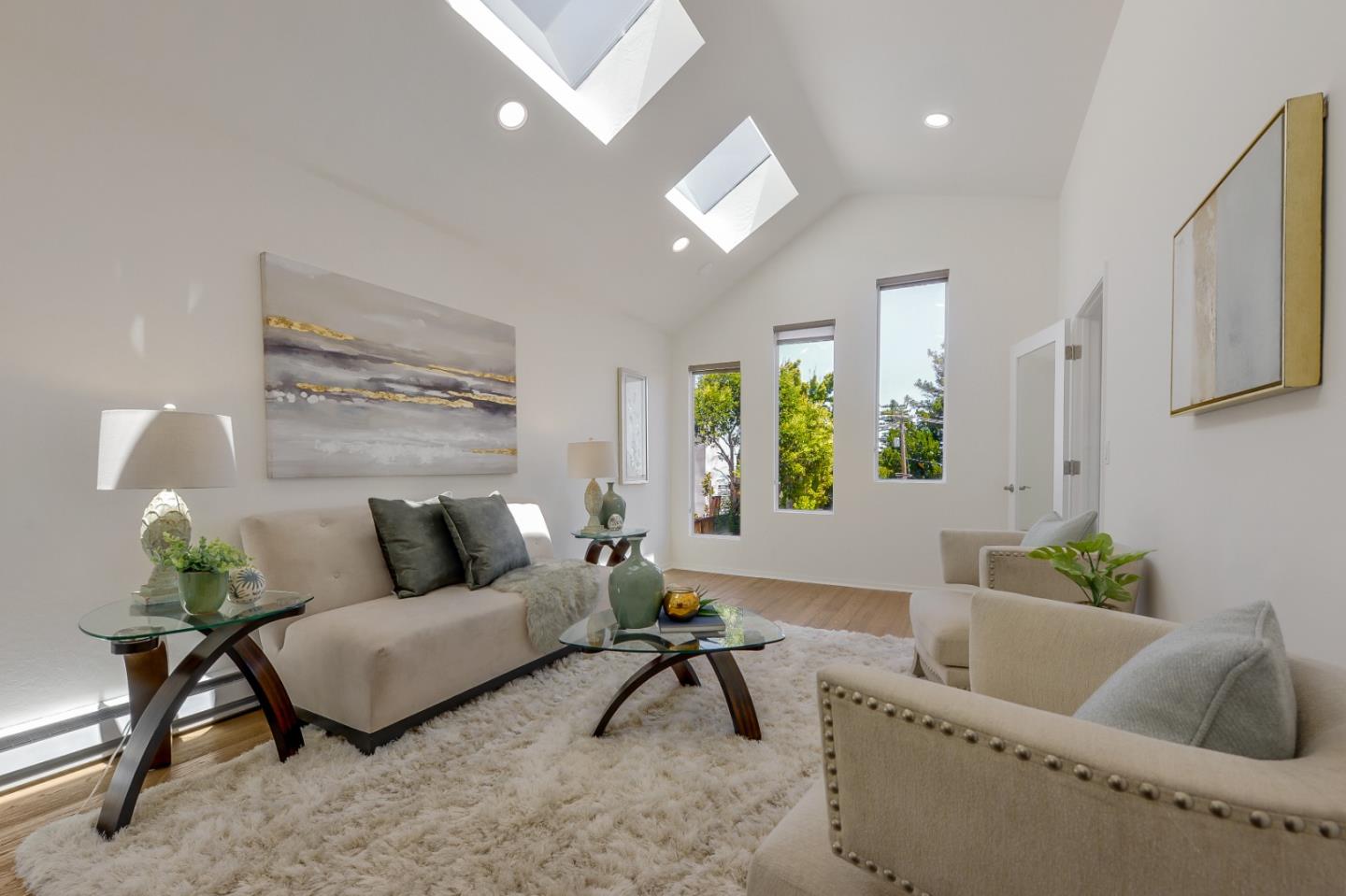 2839 Hillside Drive Burlingame, CA 94010 - Photo 13 of 43 a living room with furniture and a potted plant