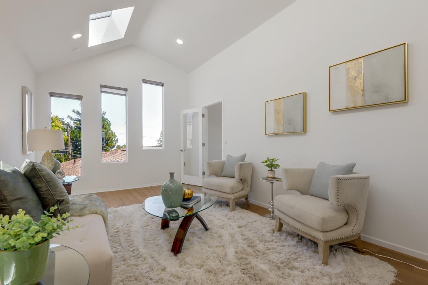 2839 Hillside Drive Burlingame, CA 94010 - Photo 14 of 43 a living room with furniture and a rug