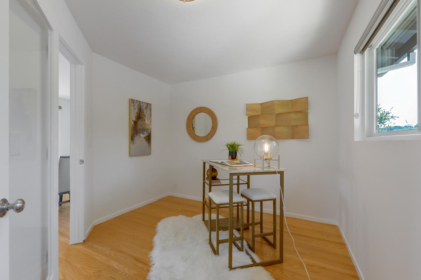 2839 Hillside Drive Burlingame, CA 94010 - Photo 15 of 43 a view of a livingroom with furniture and window