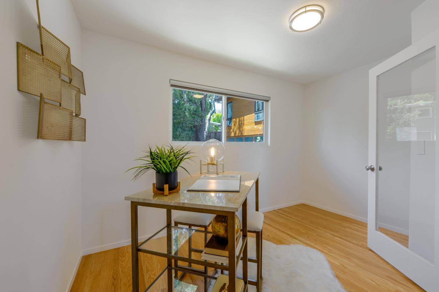 2839 Hillside Drive Burlingame, CA 94010 - Photo 16 of 43 a view of a dining room with furniture and wooden floor
