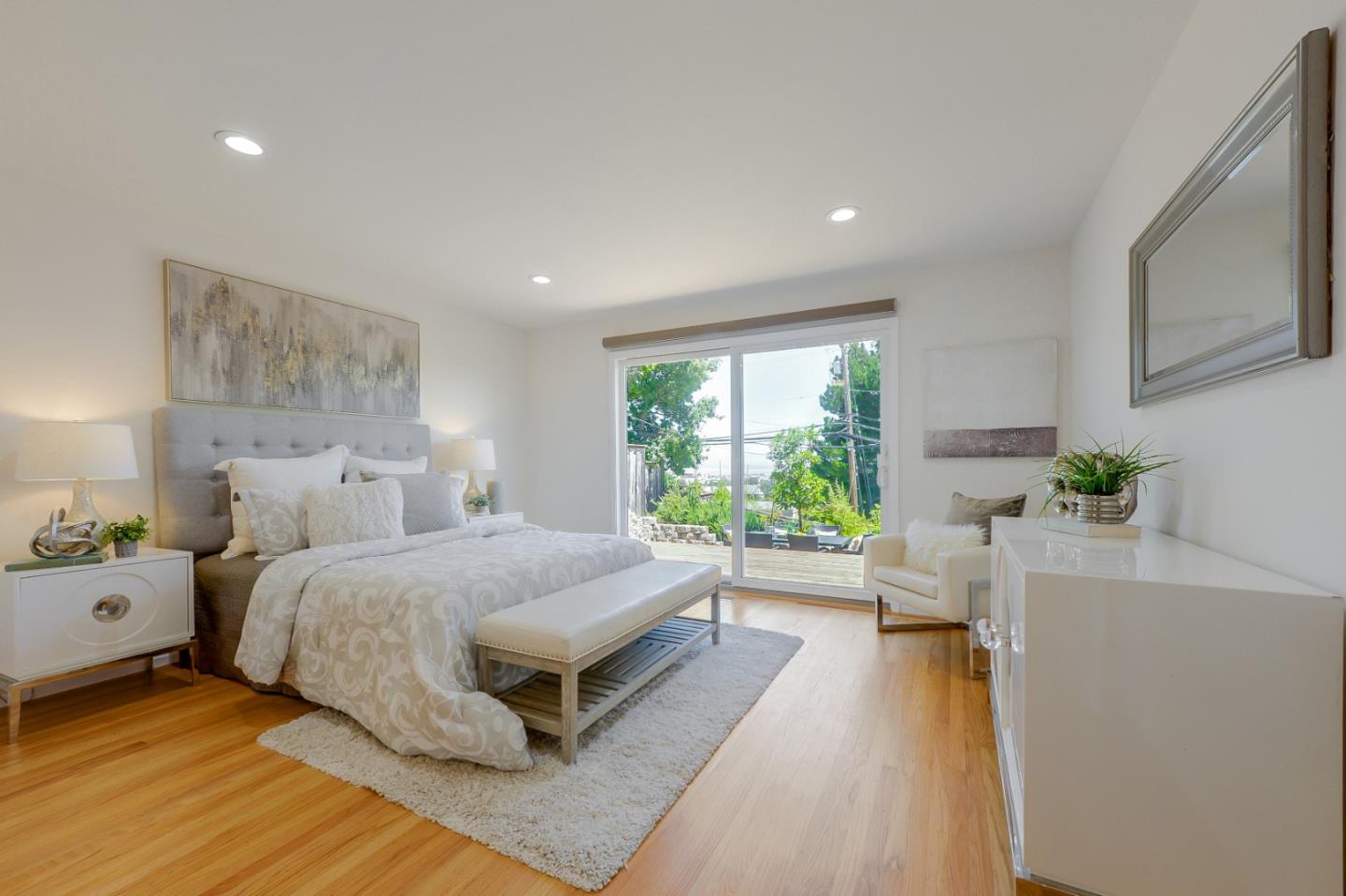 2839 Hillside Drive Burlingame, CA 94010 - Photo 21 of 43 a bed room with a bed and a couch