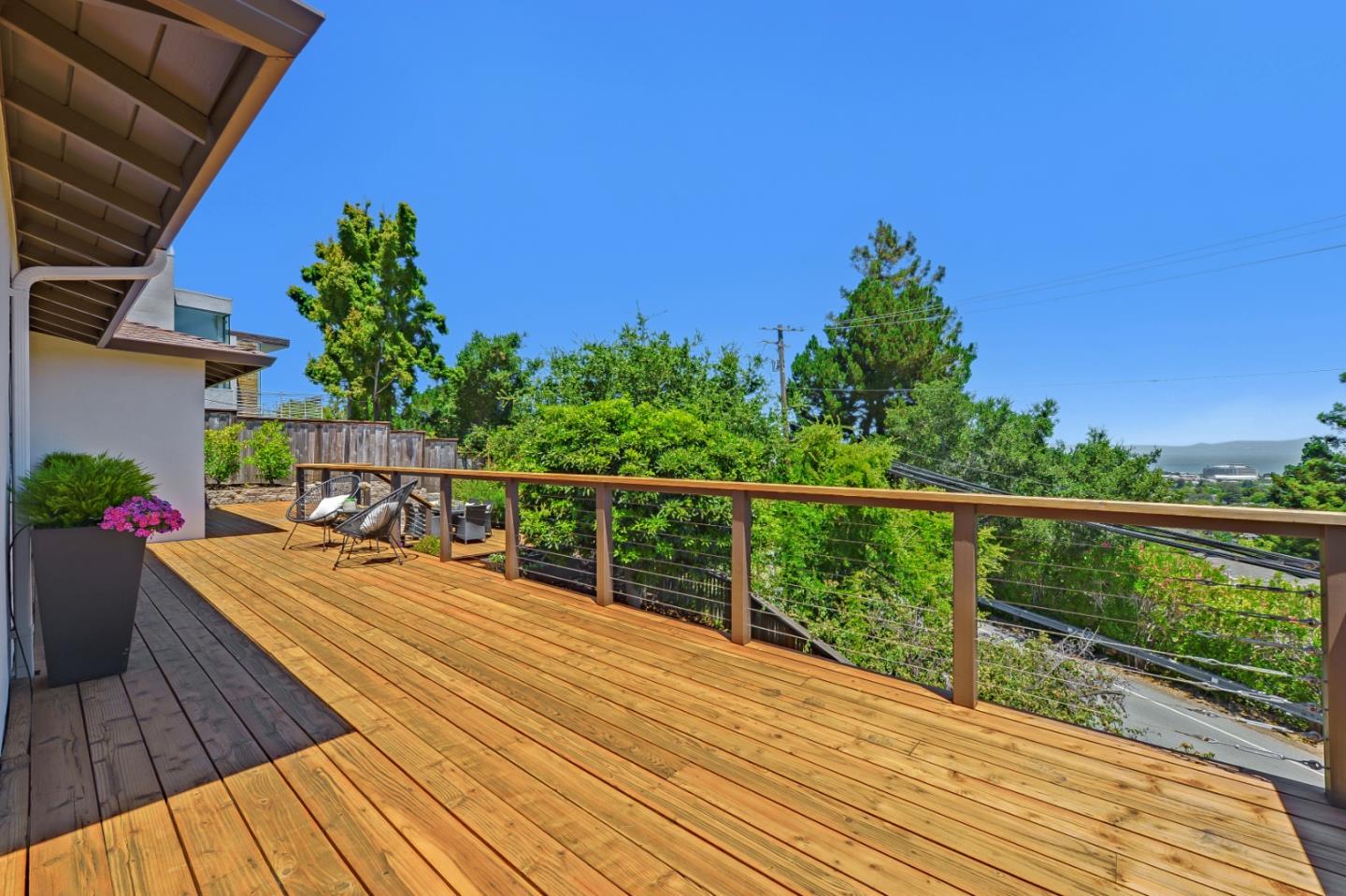 2839 Hillside Drive Burlingame, CA 94010 - Photo 39 of 43 a view of balcony with wooden floor and seating space