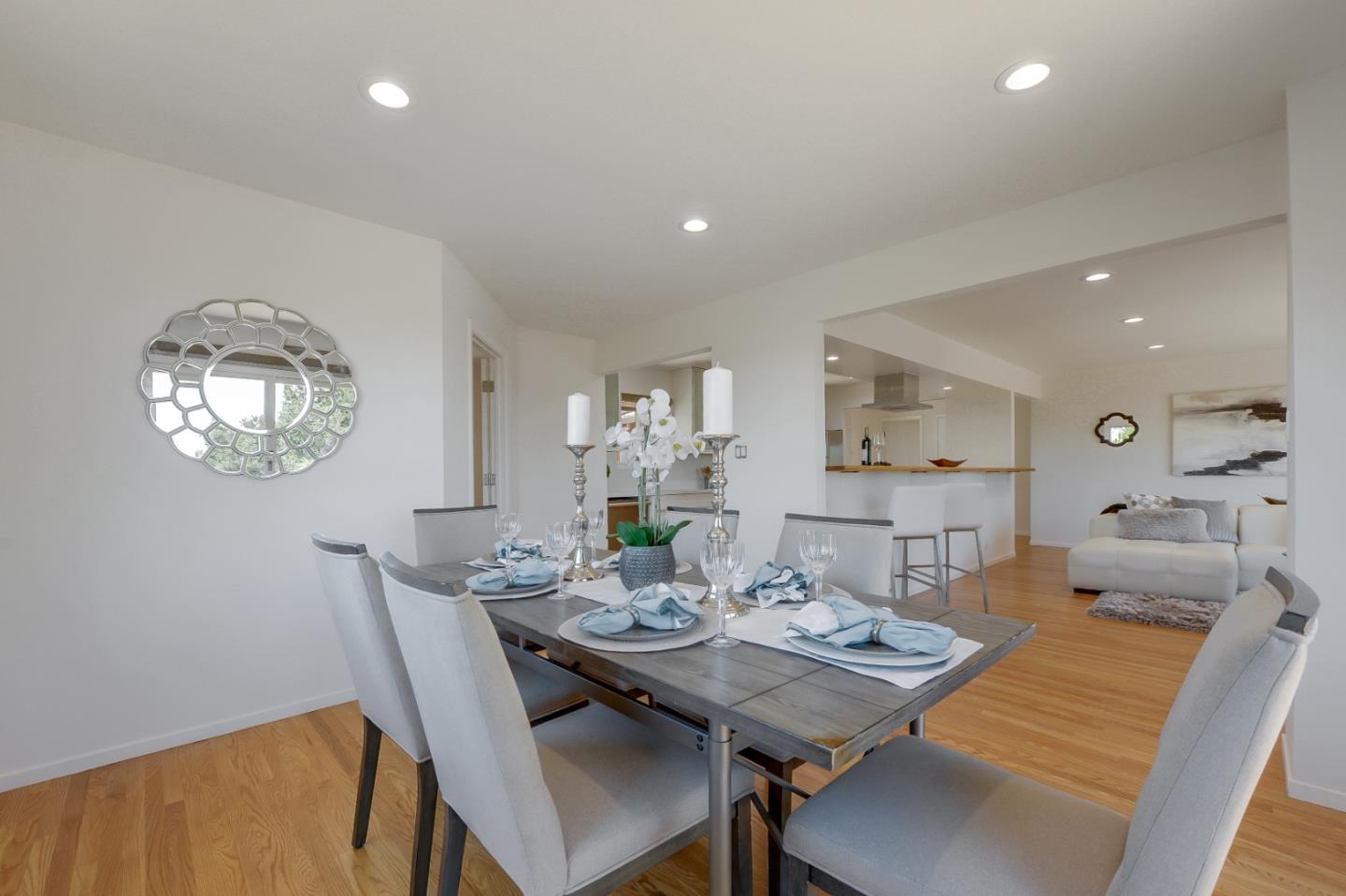 2839 Hillside Drive Burlingame, CA 94010 - Photo 5 of 43 a view of a dining room with furniture and wooden floor