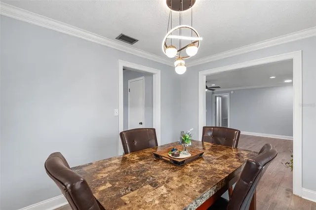 a view of a dining room with furniture