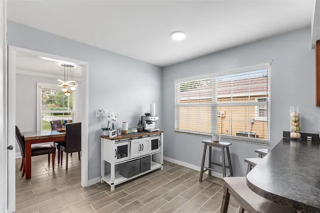 a workspace with furniture and a window