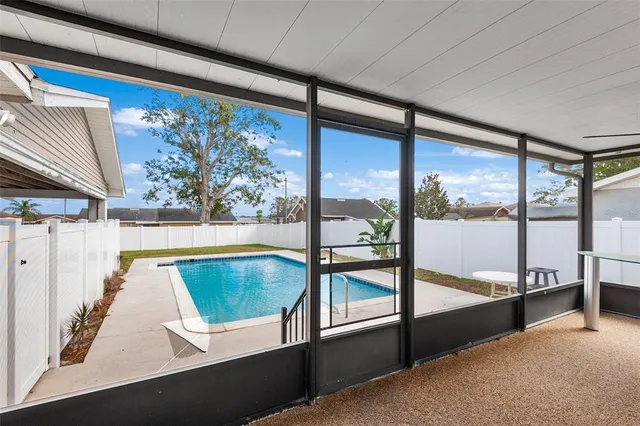 a view of a floor to ceiling window in an empty room