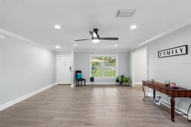 a view of an empty room with a window
