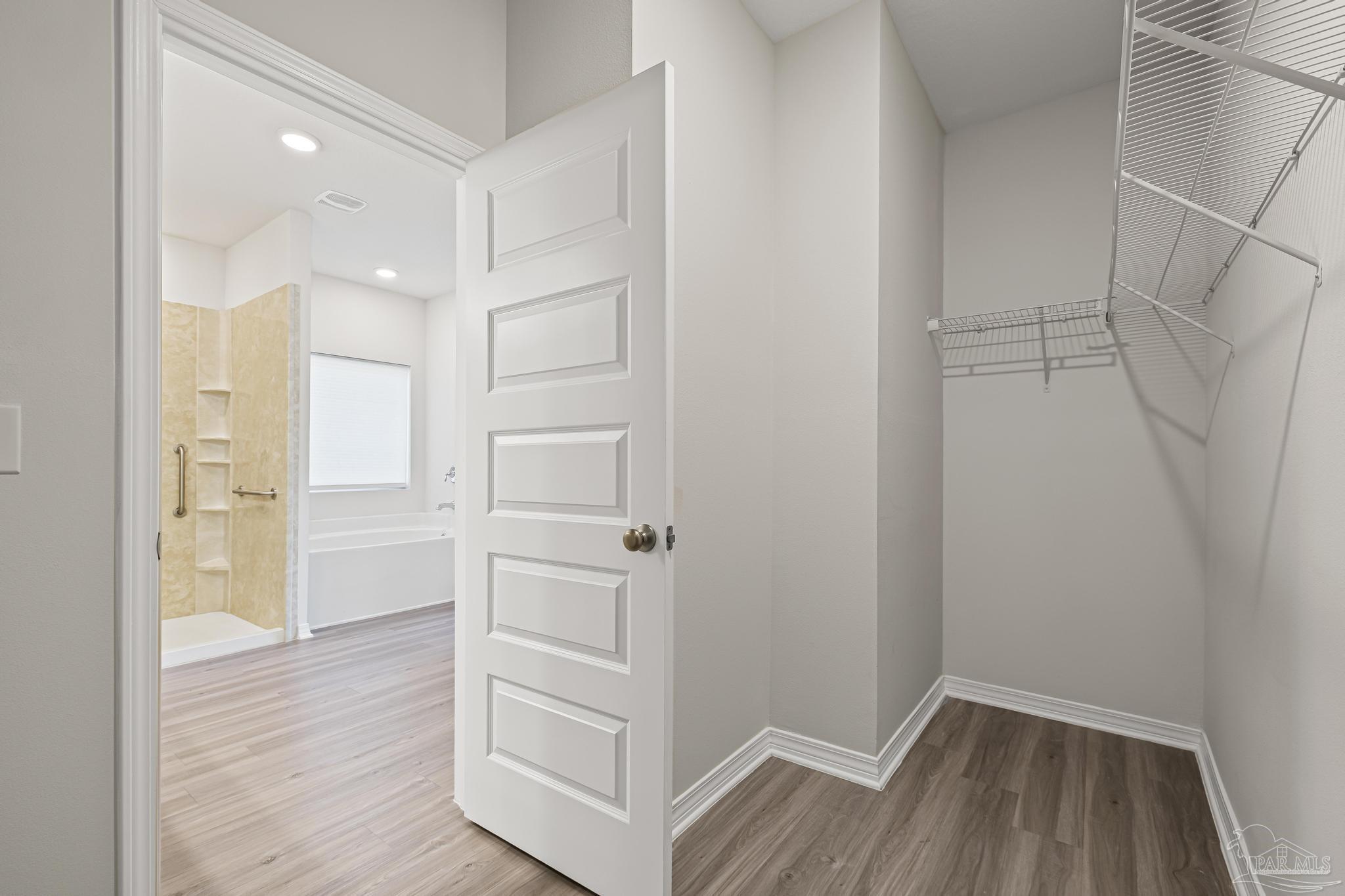 705 Hesed Court Cantonment, FL 32533 - Photo 29 of 71 MAIN WALKIN CLOSET